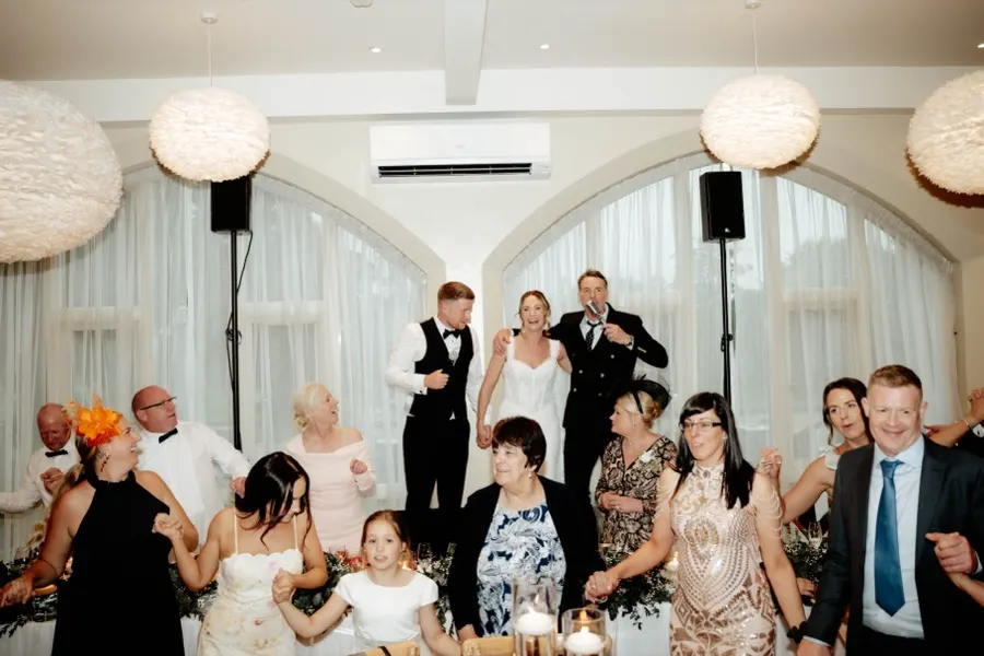 Guests dancing at a wedding reception